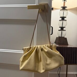 Anthropology Pleaded fox leather clutch